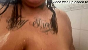 Latina milf tests the showerhead for some naughty anal play.