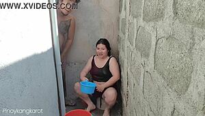 Filipina Ketahuan Mandi Luar Dapat Dipaku di Pertemuan Panas