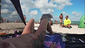 Exhibitionist Mrs. Kiss shares nude beach POV of voyeur jerking nearby