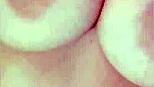 Young maid with huge tits films a close-up video for her boss hoping for a raise