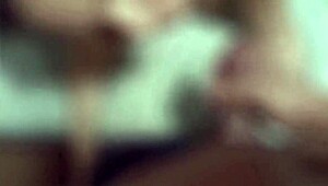 Married woman teases delivery boy with big tits, leading to footjob and cum.