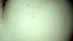 wife sits comfortably on the couch enjoying a relaxing moment