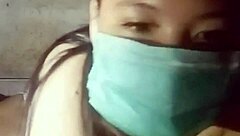 Gogo Dancing Asian Girl Showcasing Her Big Tits