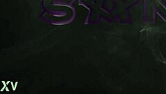 the tattooed blonde teases herself in red lingerie, reaching orgasm