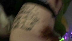tatted rave chick gives a blowjob with glowsticks in her mouth, leading to a creampie orgasm