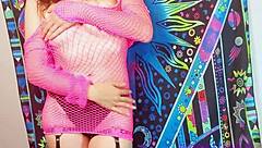 She slips into sexy fishnet lingerie