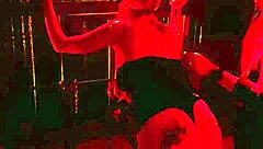 Handcuffed blonde endures hot wax backstage