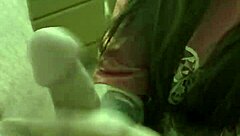 Asian babe gives handjob leading to cum facial