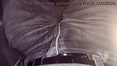 peeing in jeans during a casual moment outdoors