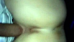 She's bent over in doggy style, riding hard.