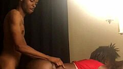 Big black cock pounds her bent-over ass