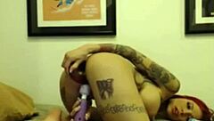 Tattooed cam girl dildoing her pussy and ass!