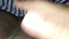 Brunette woman relaxing and touching herself gently