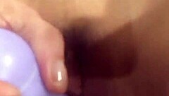 big purple dildo in a tight wet pussy.