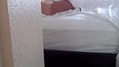 Peeping on a milf in her hotel room