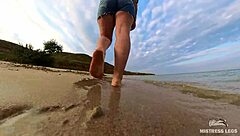 Follow wrinkled feet on sandy beach