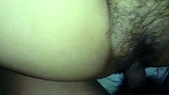 my wife lay there with her legs spread wide, showing off her hairy vagina to everyone watching.