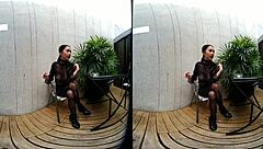 young girl smokes topless in leather skirt