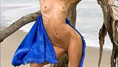 Modelz beauty poses seductively in the sand with stunning looks.