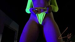 latina babe dances in panties, showing off her natural tits on webcam.