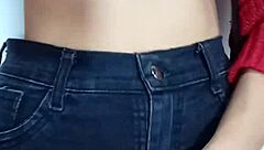 Playing with a belt, spanking my natural tits hard.