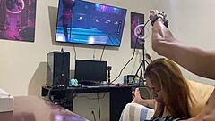 brunette sucking while he plays game