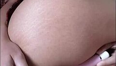 this young beauty touches herself with wild, eager fingers