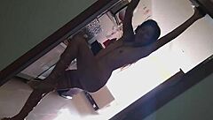 Totally naked girl shakes her ass and tits in a risky hotel corridor dance.