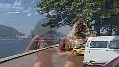 Brazilian brunette exposes pussy on Rio beach