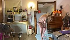 painted in red, bbw sally omalley stars in wild body art show. her curves steal the scene.