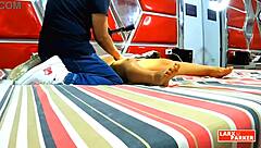 Perla Rica undergoes a full-body massage in the casting room.