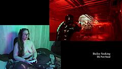 Naked brunette plays Deadspace with big natural tits