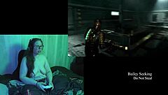 Naked brunette plays Deadspace with big natural tits