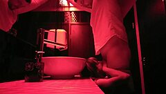 The couple is having passionate sex in the bathroom