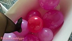 balloons and stockings create a mesmerizing bathroom scene