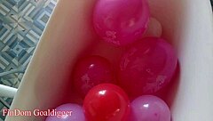 balloons and stockings create a mesmerizing bathroom scene