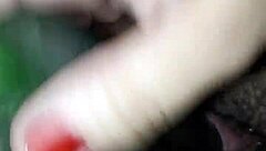 Claudia just chilling with her cucumber.