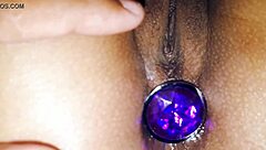 I’m obsessed with playing inside my sister’s ass with her purple plug in deep