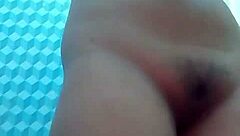 A teen performs solo pussy play on webcam