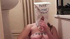 Masked slave whore endures harsh BDSM training session.