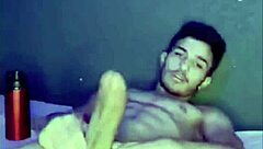 Watch this gay guy cum from solo handjob