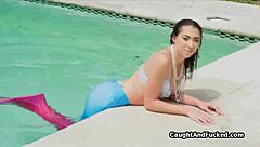 Wet teen mermaid rides big cock by the poolside today