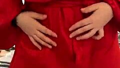 Watch this brunette tease in red lingerie?