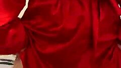 Watch this brunette tease in red lingerie?