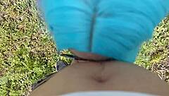 A student performs a blowjob in a public park