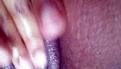 Black girl works her pussy with intense fingering