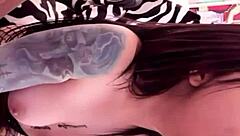 Perfect tattooed teen masturbates!