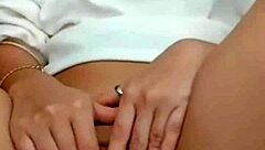 The hot brunette feels excited showing her wet pussy on webcam during masturbation.