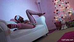 Celebrate a wet Christmas with Lily Carter squirting wildly during solo play in festive style.