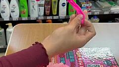 Asian Ladyboy Teases with Fresh Thong Display in Local Convenience Store Setting.